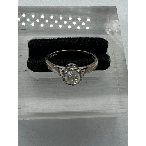 592 - A 9ct white  gold and diamond ring, size H