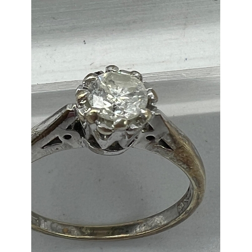 592 - A 9ct white  gold and diamond ring, size H