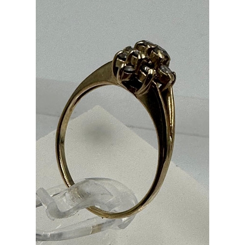 596 - A 9ct gold and diamond ring, approximate size M