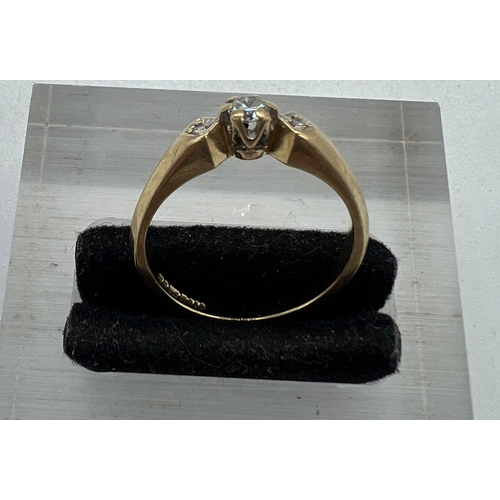 598 - A 9ct gold and diamond ring approximate size M