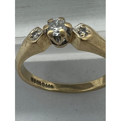 598 - A 9ct gold and diamond ring approximate size M