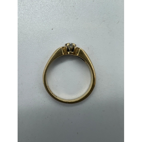 598 - A 9ct gold and diamond ring approximate size M