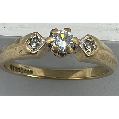 598 - A 9ct gold and diamond ring approximate size M