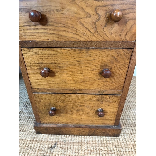 6 - An oak pedestal desk with long central drawer flanked by four shorter drawers to left and right(H75c... 