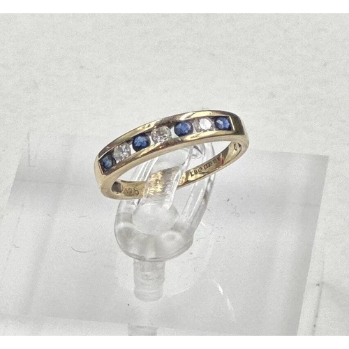 601 - A 9ct gold diamond and sapphire ring, approximate size I.