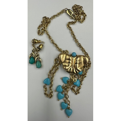 605 - A 9ct gold and turquoise set of butterfly themed necklace and earrings. (Approximate Total Weight 11... 