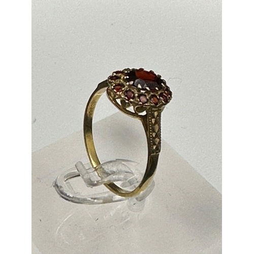 609 - A 9ct gold garnet ring ( Approximate weight 2g) Size N 1/2