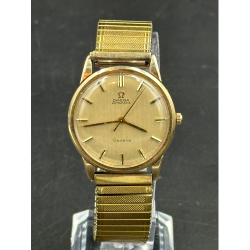 613 - A 9ct gold Omega Automatic Geneve on expandable stainless steel bracelet with engraved back.