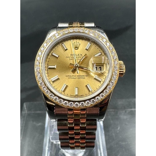 619 - A Ladies Rolex Oyster Perpetual Datejust with diamond bezel, two tone gold and silver wristwatch box... 