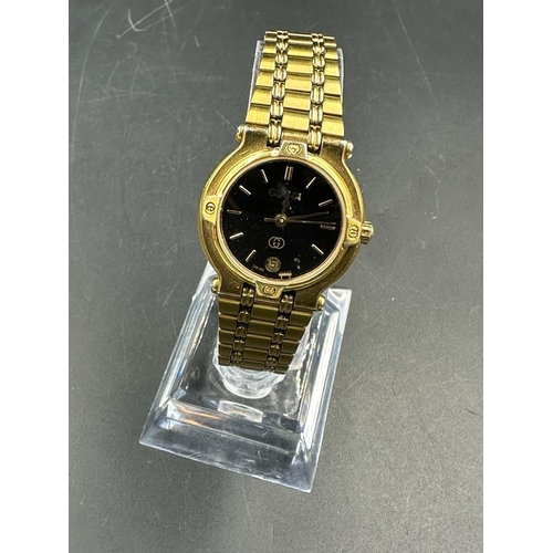 628 - A gold plated Gucci ladies watch Model 9200L