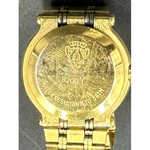 628 - A gold plated Gucci ladies watch Model 9200L