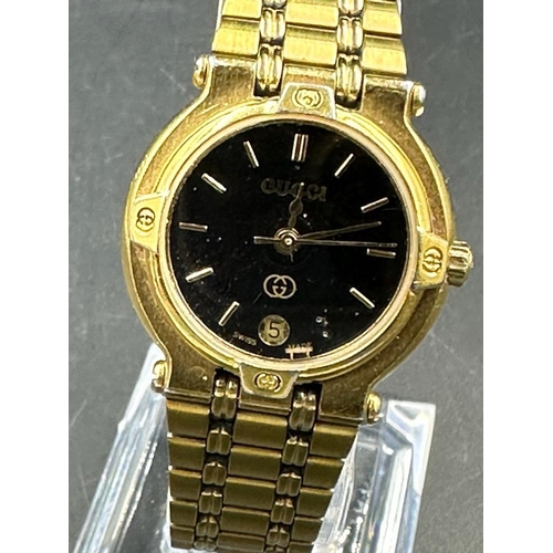 628 - A gold plated Gucci ladies watch Model 9200L