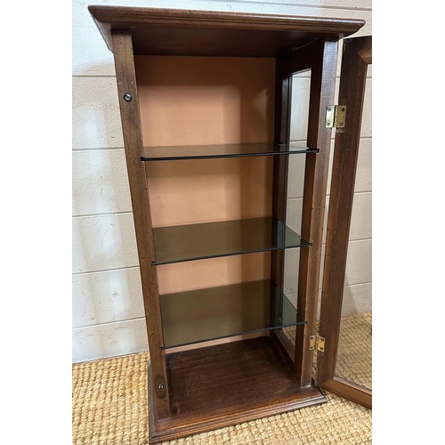 65 - A mahogany wall hanging display cabinet, glazed on three sides with three glass shelves (H63cm W33cm... 