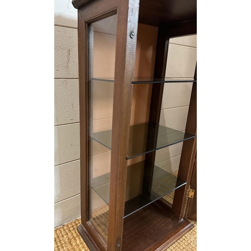 65 - A mahogany wall hanging display cabinet, glazed on three sides with three glass shelves (H63cm W33cm... 