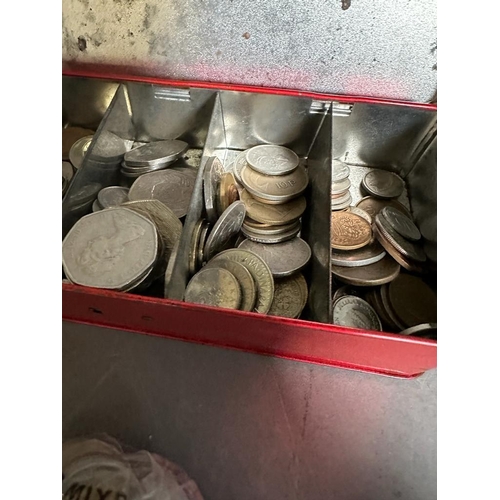 650 - Two tins with a mixture of world and United kingdom coins, various denominations, conditions and yea... 