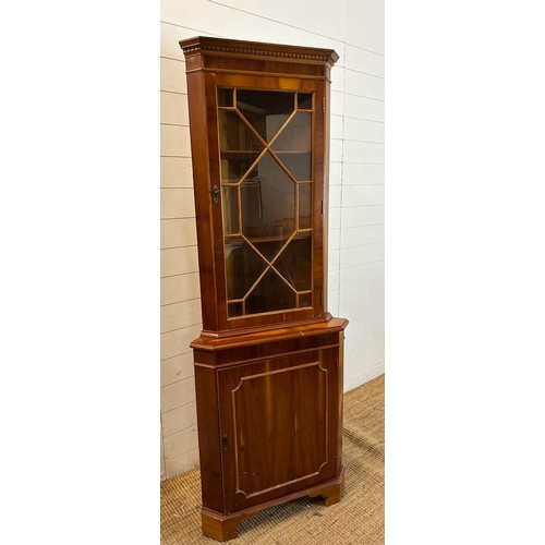 67 - A glazed corner cabinet with cupboard under