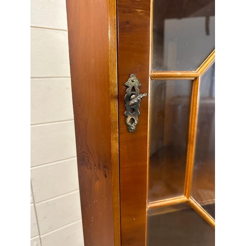 67 - A glazed corner cabinet with cupboard under