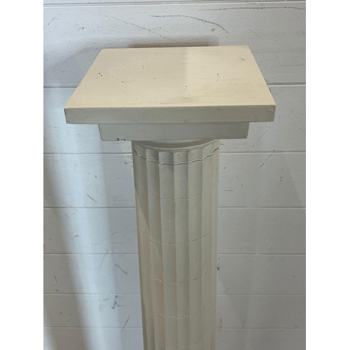 678 - A fluted wooden Corinthian column pedestal with a bust of a Greek God