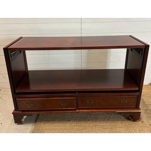 68 - A flamed mahogany metamorphic dining table with two drawers under and two upholstered benches AF