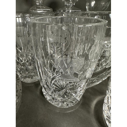 683 - A selection of golfing glassware to include decanters trophies and tankards