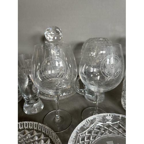 683 - A selection of golfing glassware to include decanters trophies and tankards