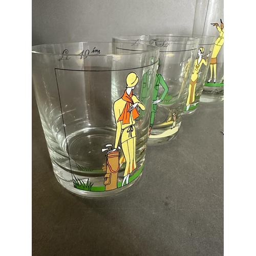 684 - A selection of golf items novelty glassware