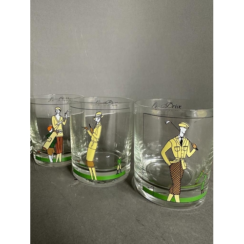 684 - A selection of golf items novelty glassware