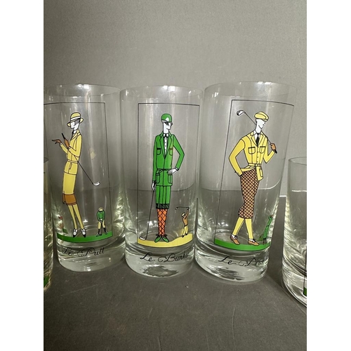 684 - A selection of golf items novelty glassware