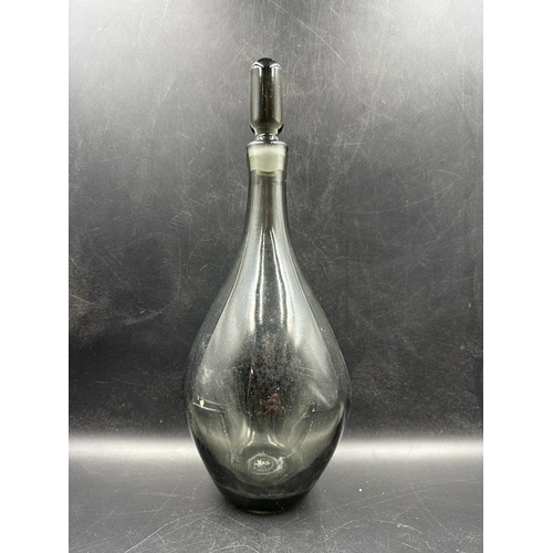 688 - A selection of glassware to include a mid century grey smoked glass decanter and six matching glasse... 