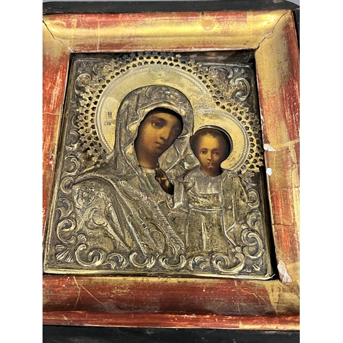 690 - A Russian icon in glazed case 18cm x 20cm