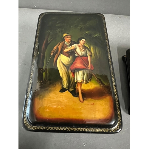 693 - Three lacquered boxes with courting couples to front