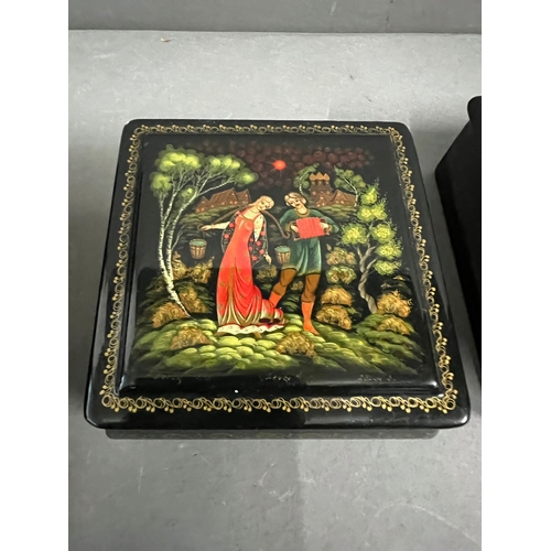 693 - Three lacquered boxes with courting couples to front