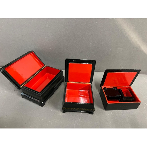 693 - Three lacquered boxes with courting couples to front