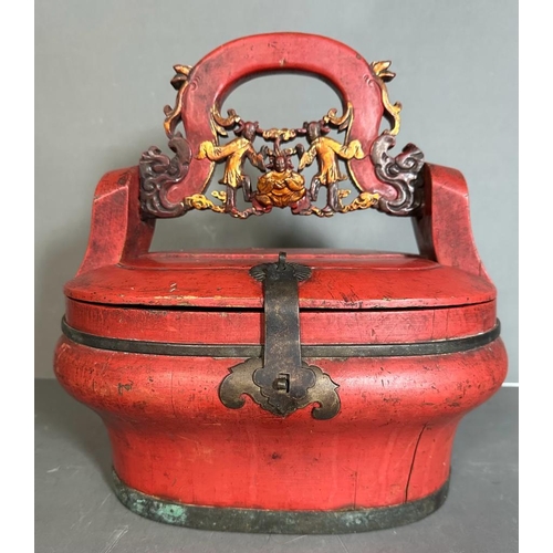 695 - A Chinese red lacquered wedding or food basket