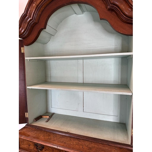 7 - A Queen Anne revival walnut panelled cabinet on two over three chest with block feet, brass handles ... 