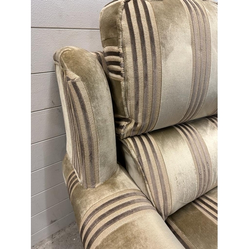 71 - A three seater Parker Knoll sofa upholstered in stripe greys and greens