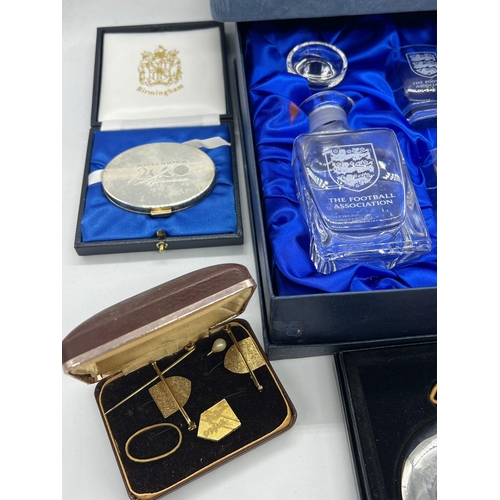 713 - A collection of FA medals and memorabilia items