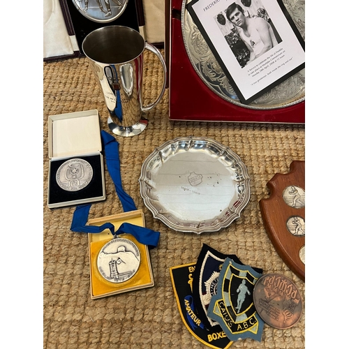 722 - A large collection of boxing memorabilia trophies, posters including coins and silver plate