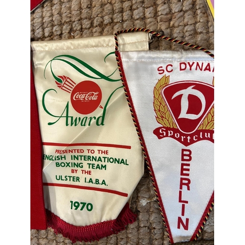 727 - A selection of boxing pennants