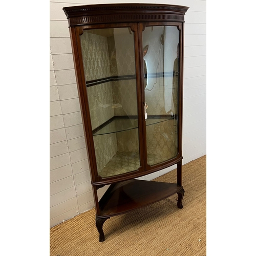 73 - An Edwardian mahogany corner unit with barrel glazed front and cabriole legs (H185cm W105cm D70cm)