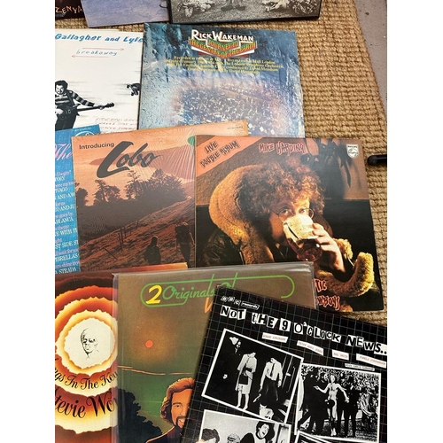 737 - A selection of vinyl Lps to include Elton John, Michael Jackson and George Harrison