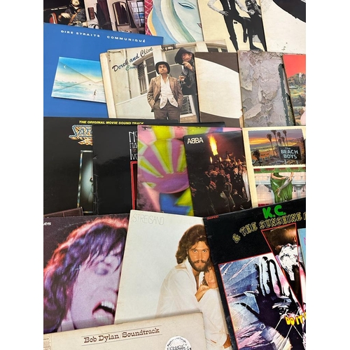 738 - A selection of vinyl Lps to include Cliff Richards (signed), Paul Simon and Joni Mitchell