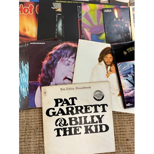 738 - A selection of vinyl Lps to include Cliff Richards (signed), Paul Simon and Joni Mitchell