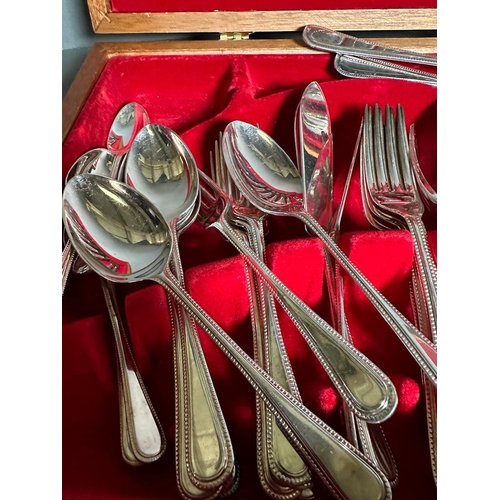 745 - Two part canteens of stainless stell cutlery, knives, forks, spoons etc