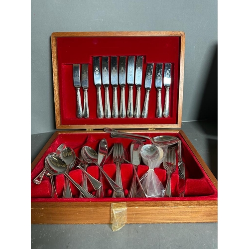 745 - Two part canteens of stainless stell cutlery, knives, forks, spoons etc