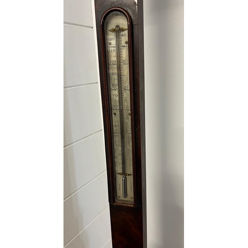 747 - A Mid Victorian figured walnut stick barometer