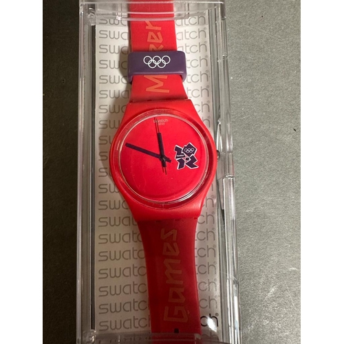 749 - Olympics 2012 memorabilia from a member of the support team to include uniform, phone , Swatch watch... 