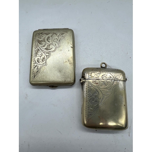 752 - Two white metal vesta cases and one brass