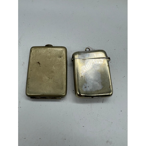 752 - Two white metal vesta cases and one brass