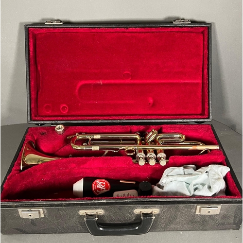 753 - A cased trumpet